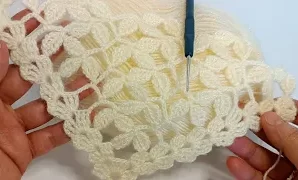 Aprende a tejer este fácil patrón de chal triangular.